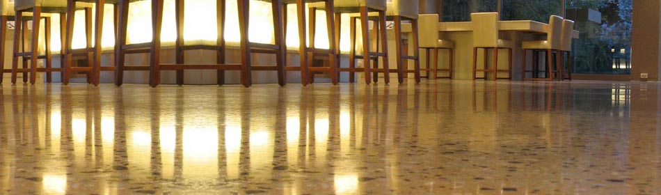 Polished concrete:  Benefits of polished concrete - 
	<a href='http://www.procotech.be/produits-procotech.php?lg=uk&pg=produits-procotech&se. 
	Benefits of polished concrete
	Being a superior durable product, polished concrete by « Procotech » offers an alternative to troweled concrete, epoxy solutions, granite, marble tiles.
	It is a high quality finish for industrial, commercial and residential flooring. (Factories, shopping centers, showroom…..)
	
	Polished concrete floor can be beneficial in countless industrial, commercial and residential applications (factories, shopping centers, showroom..)
	
	Some key benefits of polished concrete are :
	
	Aesthetics
	Polished concrete gives not only a glossy flat surface that is «shiny, beautiful and striking. » but also a wide range of gloss, colors and aggregates (exposed, semi-exposed or “salt & pepper”).
	Note : It is important to understand that polished concrete can expose some of the concrete’s imperfections
	
	 Economical
	• Start from 20€/m²
	• Can be realized on any existing concrete surface
	• Lifespan is 20 years average
	*a light rework is then required to extend for 10 more years
	• Less maintenance cost in High trafic areas (schools, hallways, corridors)
	• Easy to clean
	• High resistance to scuffmarks and tiremarks
	
	 Improved Ambient Lighting
	• High light reflectivity of polished concrete => fewer overhead lights required
	
	 Stain resistant
	• Inhibits stains from oil and liquids
	
	 Environmentally Friendly
	
	• Dry Grinding and Polishing process
	• No Volatile Organic Compounds (VOCs) in the process
	• No or little slurry
	• No hazardous waste
. 2.1 Polished concrete, 2.1.1 Benefits of polished concrete